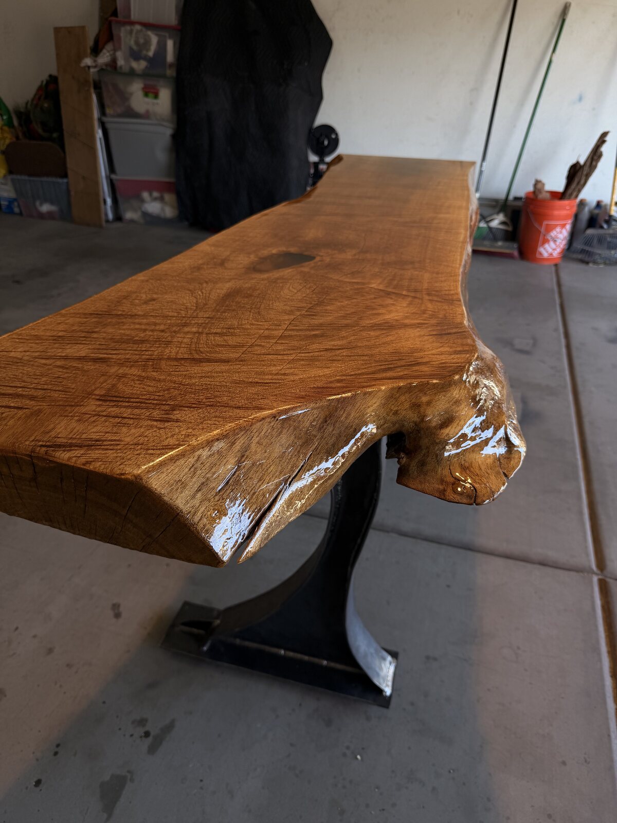 Live-edge mesquite wood desk on curved welded steel wishbone legs