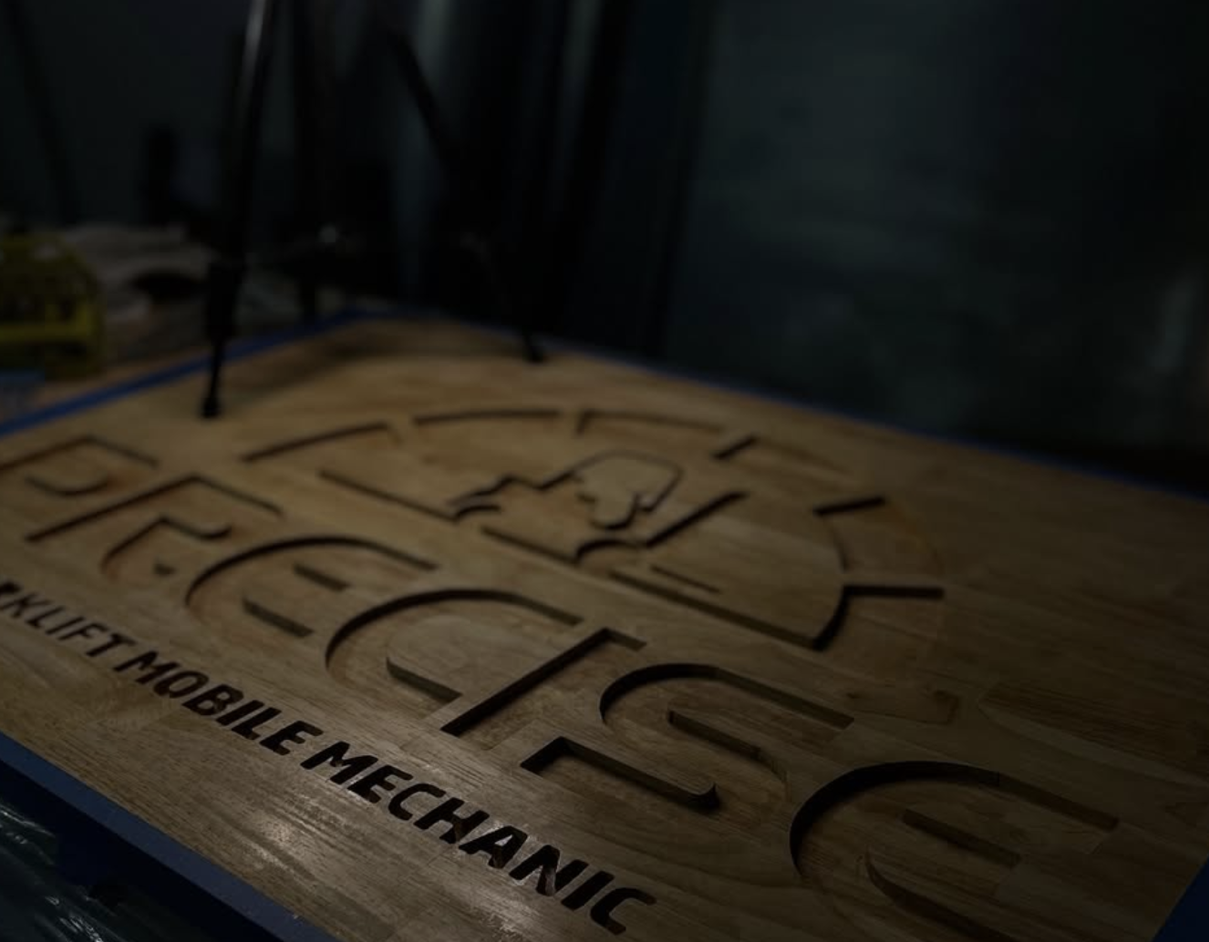 CNC-carved business sign modeled in 3D and machined